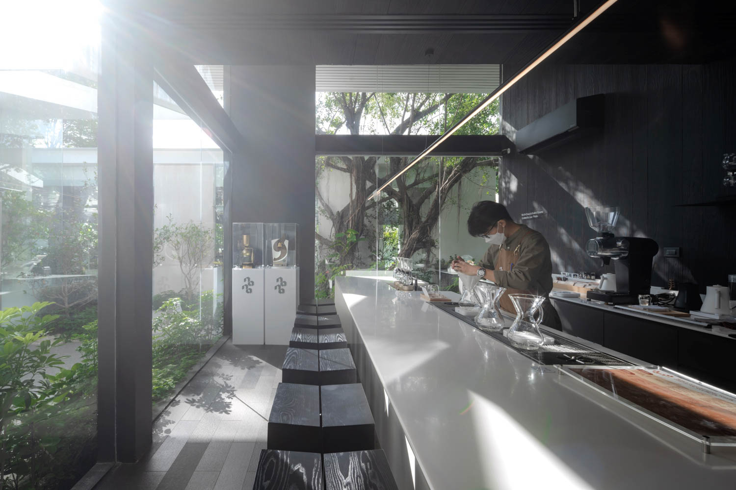 counter Nana Coffee Roasters Bangna / IDIN Architects